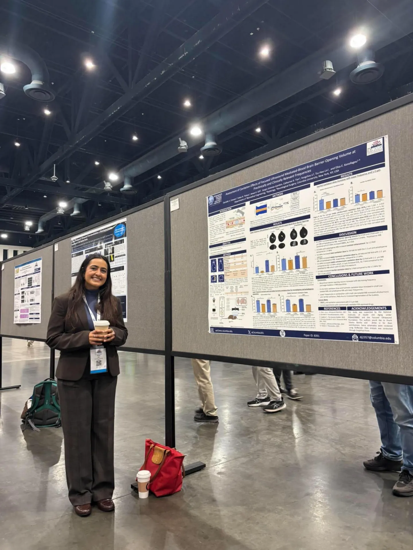 student presenting poster