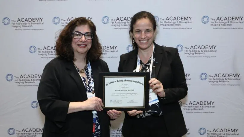 Professor receiving award